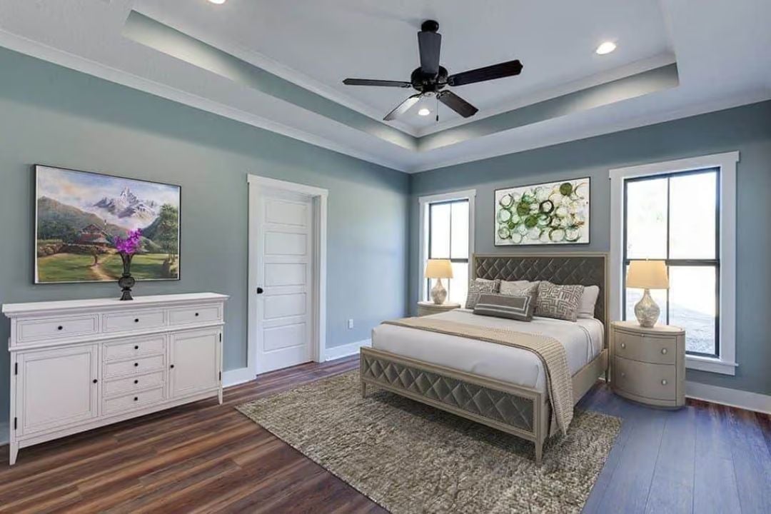 Tray Ceiling, Quilted Headboard, Soft Blue Walls Built for Winding Down