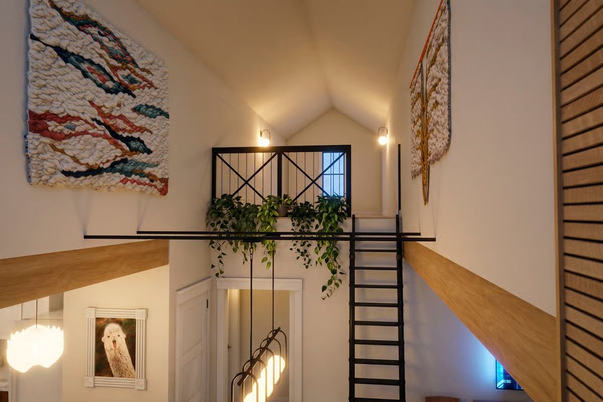 Hanging Plants, Textile Art, and a Loft That Earns Its Altitude