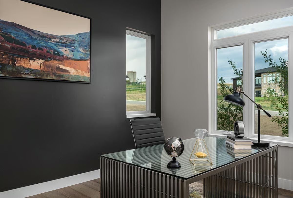 Dark Walls, Glass Desk, and Art That Pulls the Whole Room Together