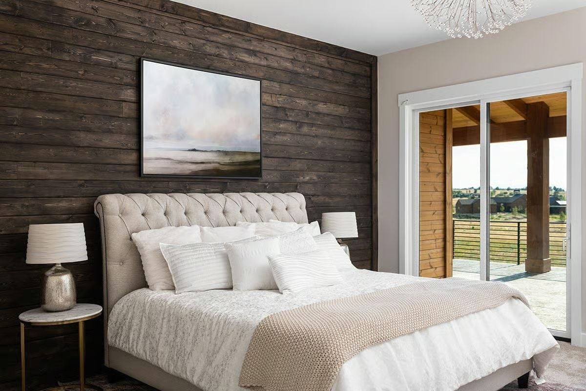 Dark Wood Shiplap, Tufted Headboard, and Art That Earns the Wall It's On