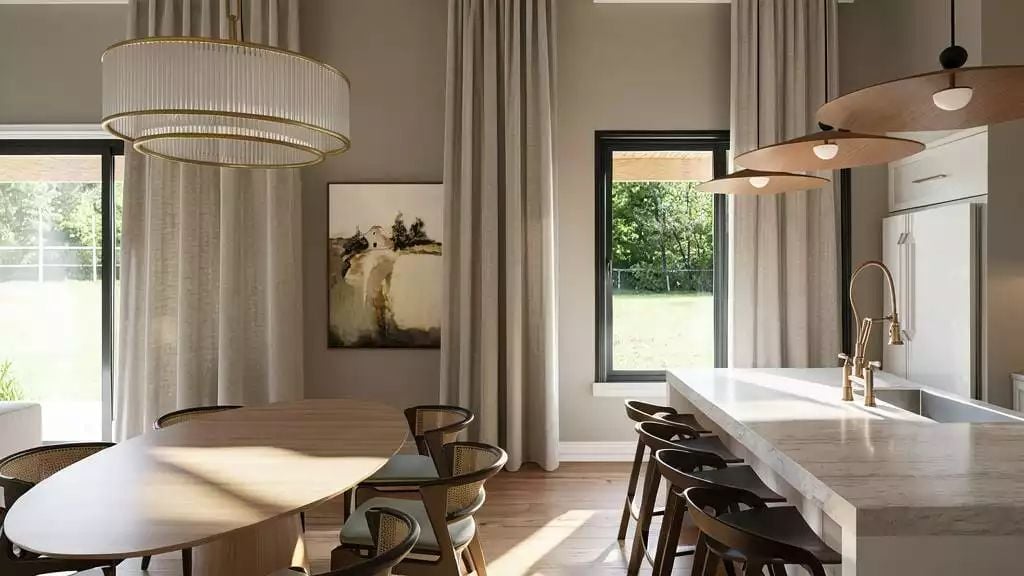 Gold Hardware, Cane Chairs, and a Kitchen Island That Earns Its Square Footage