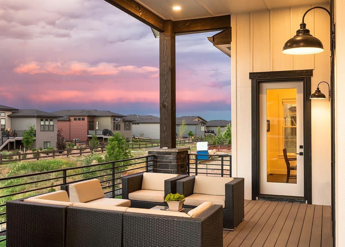Covered Deck Seating That Makes a Pink-Sky Sunset Feel Like the Whole Point