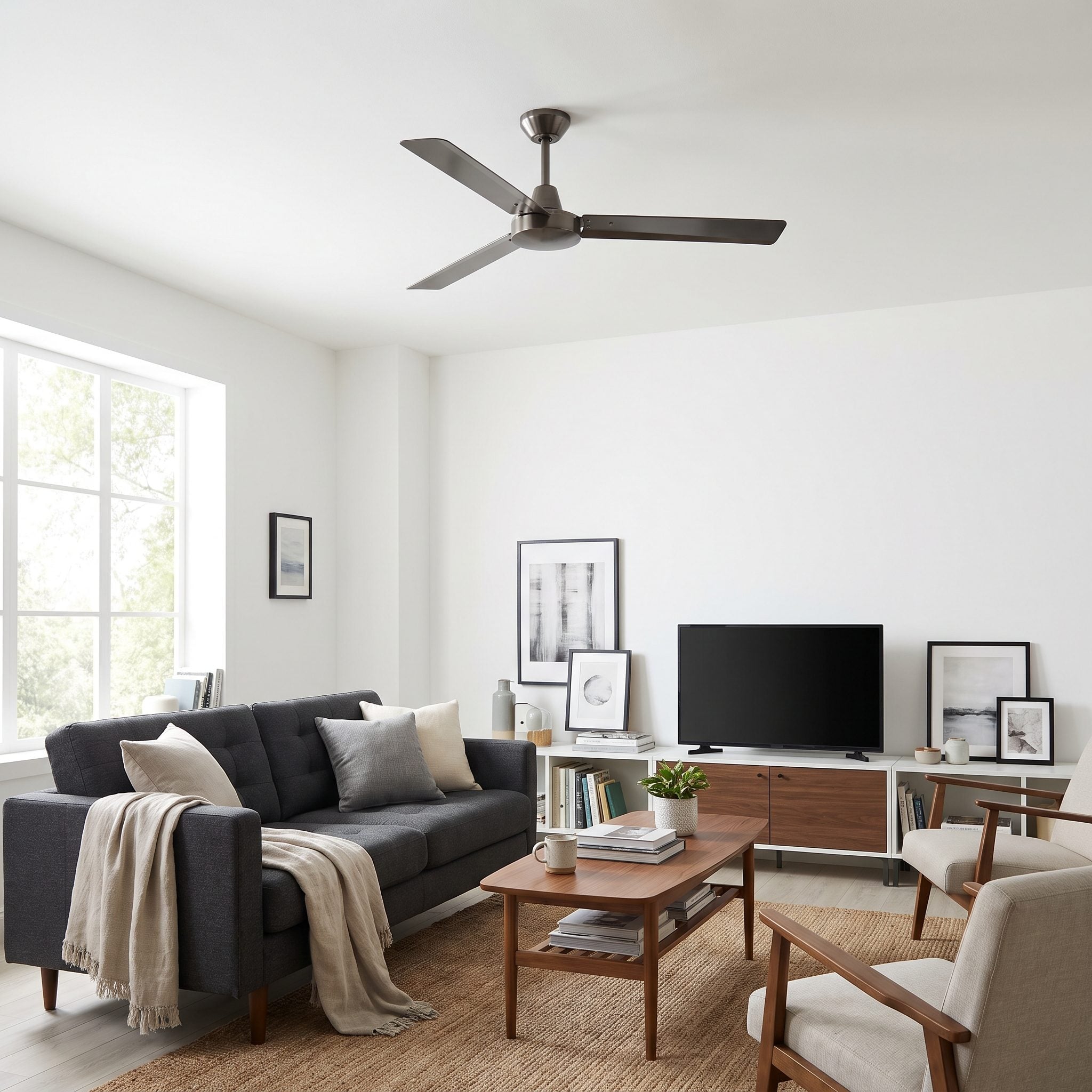 Contemporary living room with a white three-blade ceiling fan on a six-inch downrod hanging about 12 inches below a