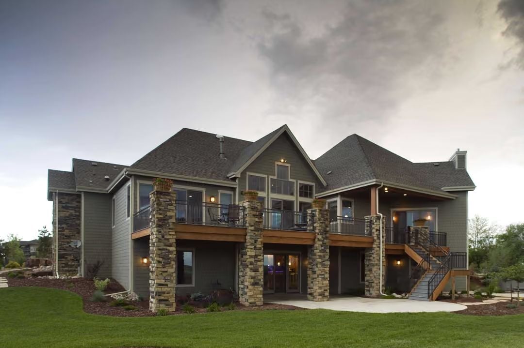 Stacked Stone Columns and Cedar Decking Built for the Long Game