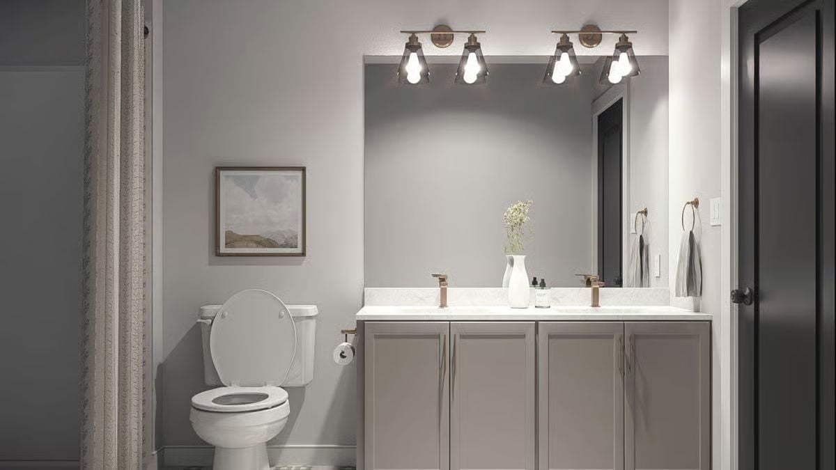 Brass Faucets, a Vase of Stems, and Vanity Lighting That Does Real Work