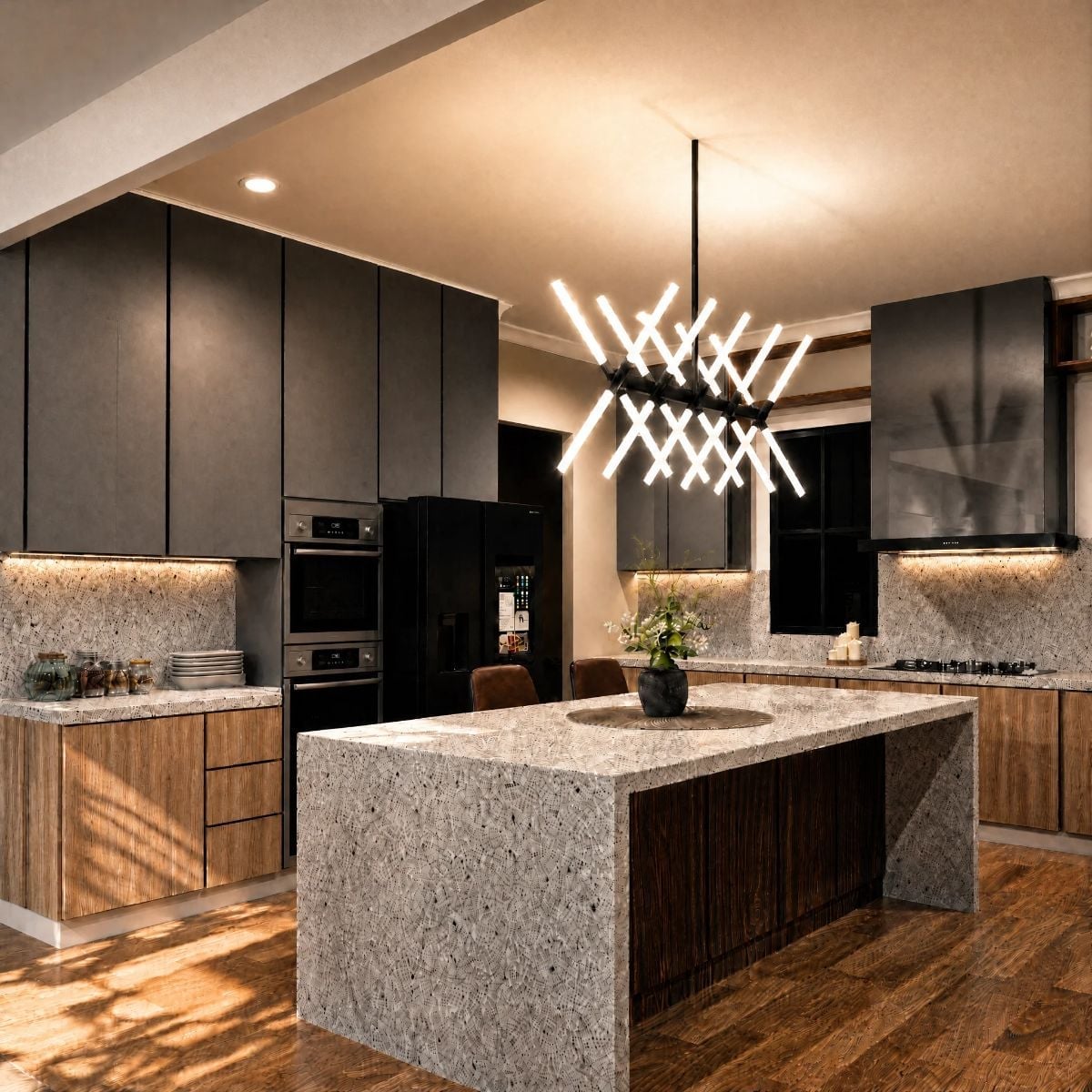 Crossed-Tube Chandelier, Granite Waterfall Island, and Cabinet Lighting That Earns Its Keep