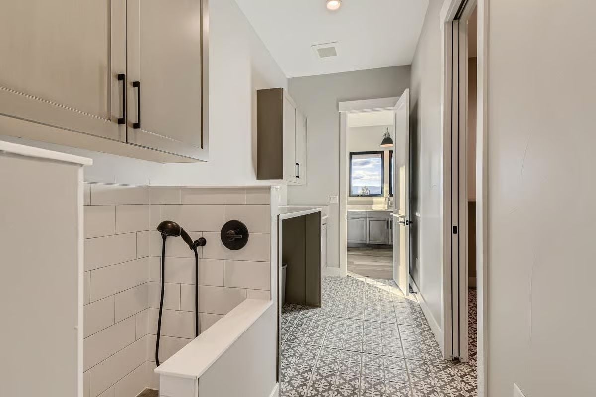 Subway Tile, Oil-Rubbed Bronze, and a Dog Wash Station That Pulls Real Weight