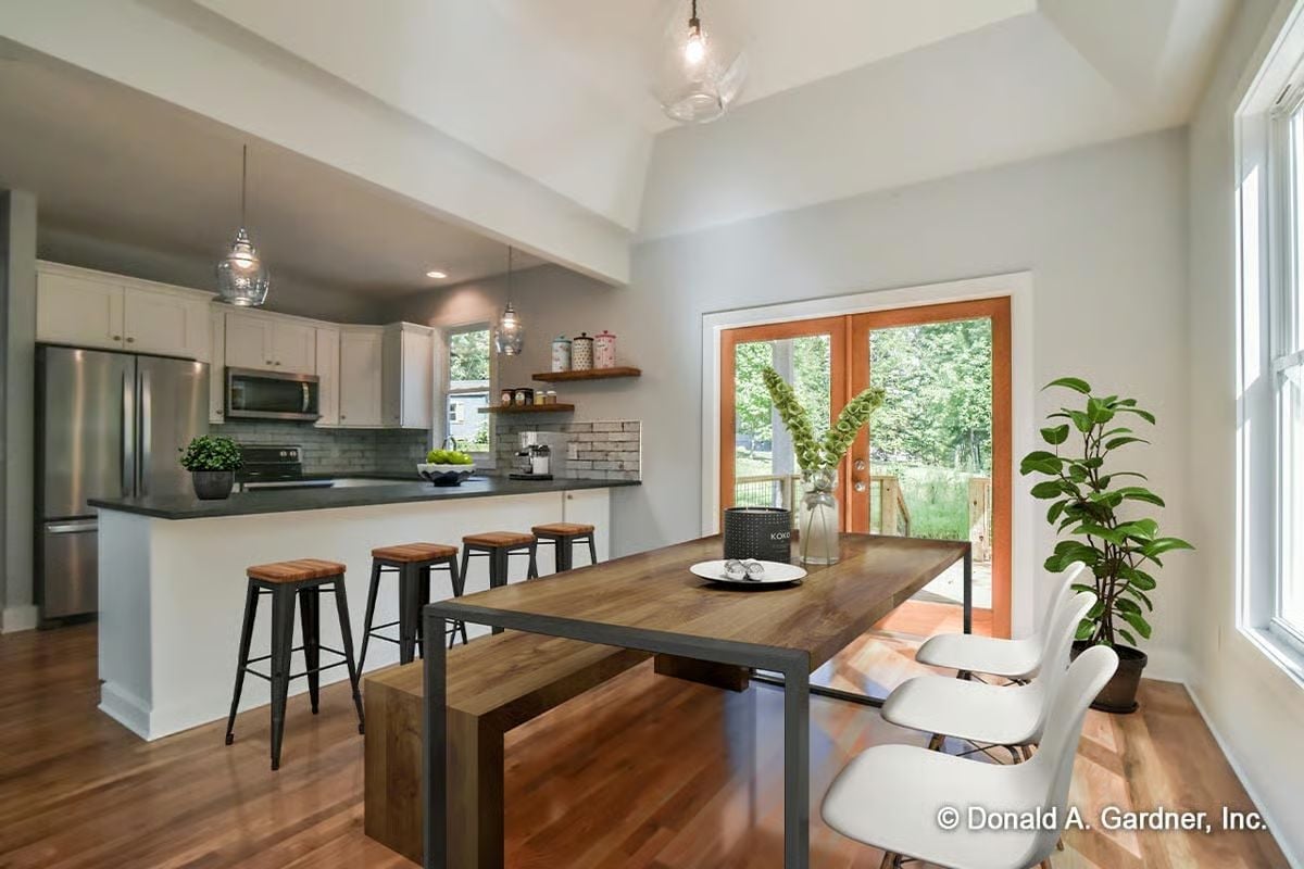 Pendant Lights, a Wood Table, and French Doors That Make Dinner Feel Like a Destination