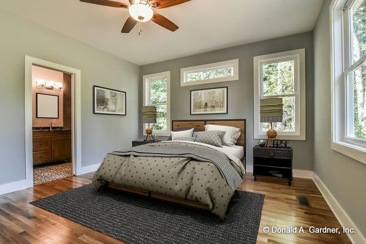 Wood Headboard, Gray Walls, and a Ceiling Fan That Earns Its Keep