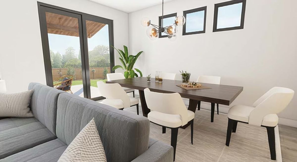 Sliding Glass, White Chairs, and a Chandelier That Earns Its Spot Above the Table