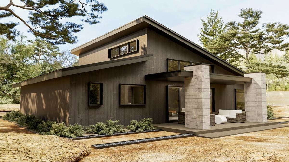 Dark Wood Siding, Stone Columns, and a Covered Porch Worth Sitting On