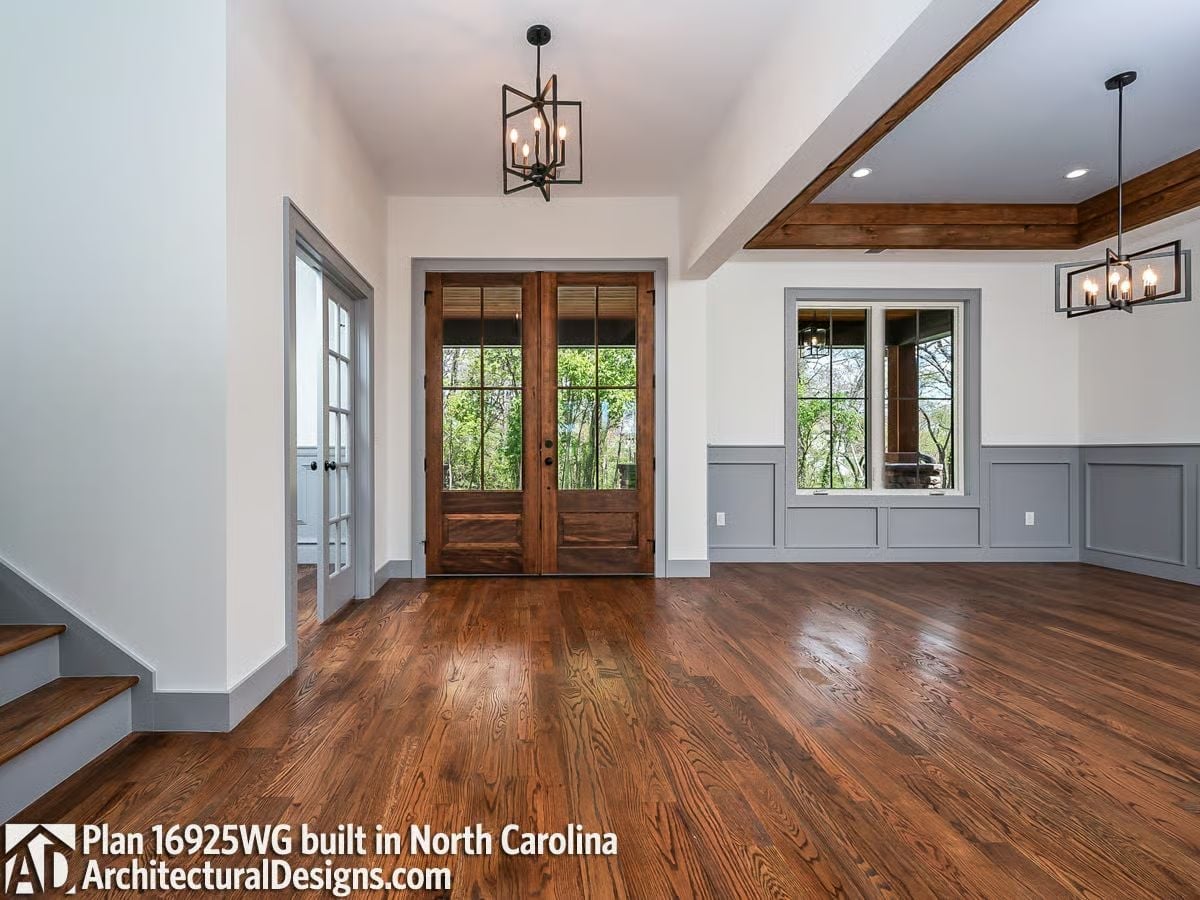 Double Front Doors and Exposed Beams Set the Tone for Every Gathering