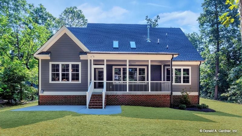 Covered Rear Porch With Brick Foundation That Doesn't Need to Try Hard