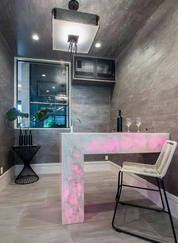 Backlit Stone Bar That Glows Pink From the Inside Out