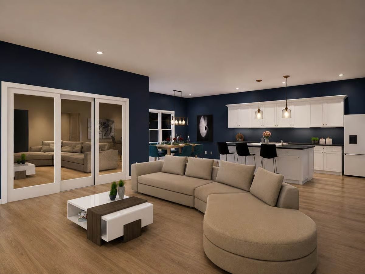Navy Walls Do the Heavy Lifting So the Furniture Doesn't Have To