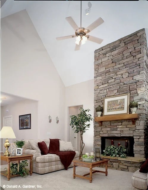 Soaring Stone Fireplace, Vaulted Ceiling, and a Room Built Around Both