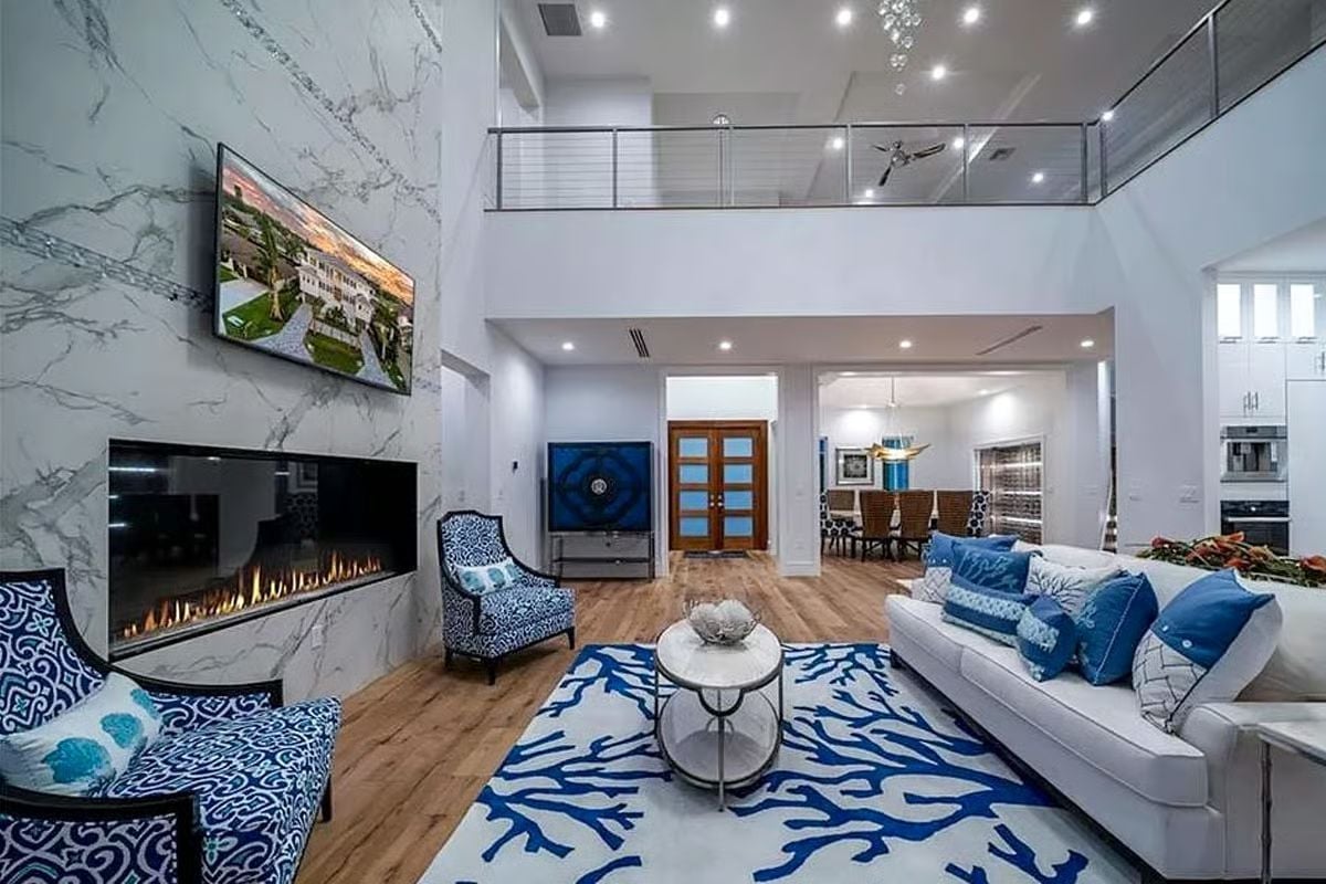 Double-Height Drama With a Coastal Blue Palette That Pulls It Together