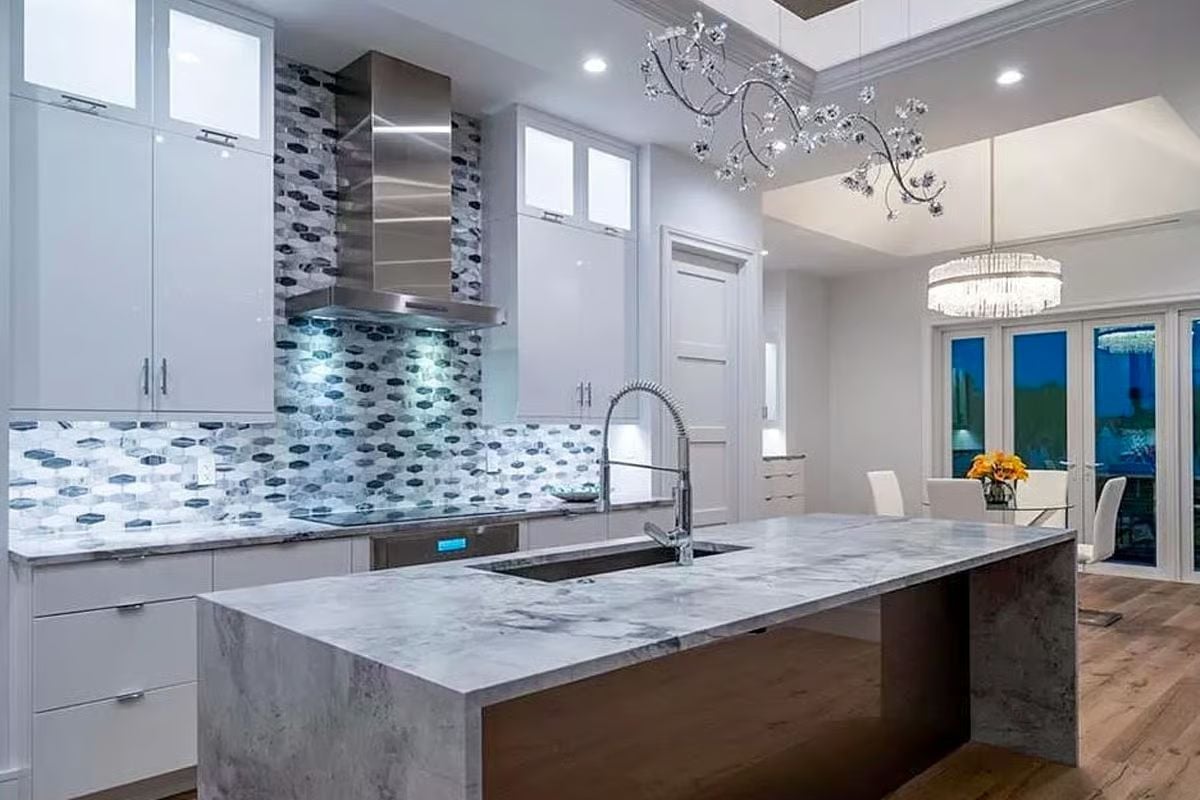 Hexagon Tile Backsplash Steals the Show in This Modern White Kitchen