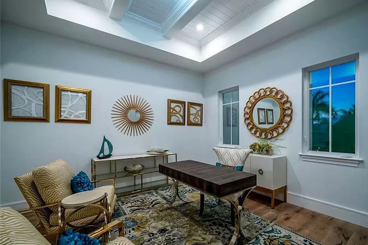 Sunburst Wall Decor and a Coffered Skylight Give This Home Office Real Presence