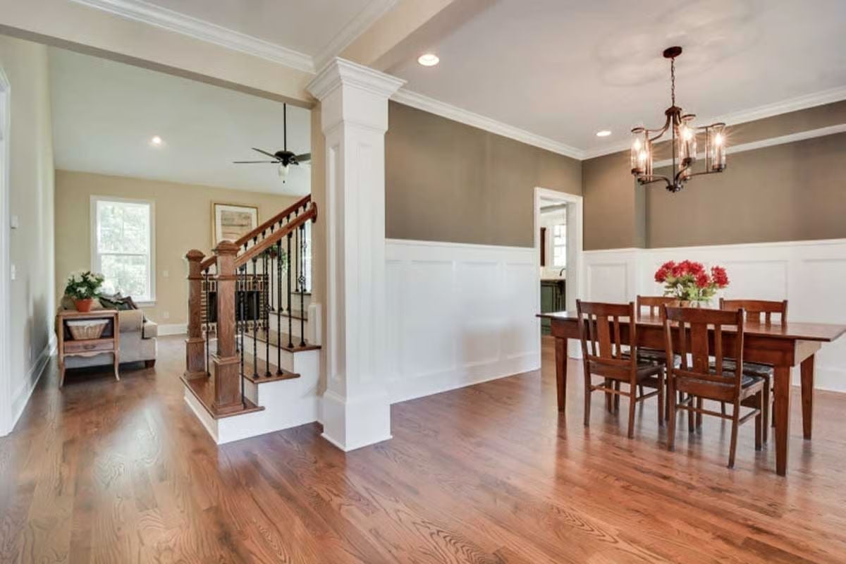 Wainscoting, Warm Wood, and a Table Built for Staying a While