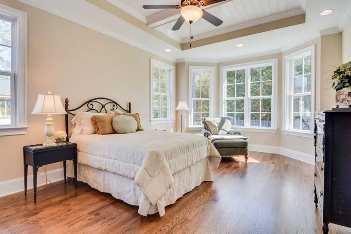 Wrought Iron Headboard, Bay Windows, and a Coffered Ceiling Worth Looking Up At