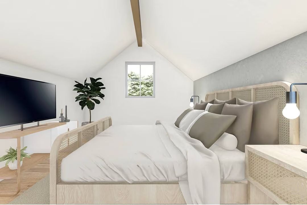 Rattan Bed Frame, Vaulted Ceiling, and One Good Plant Do Most of the Work