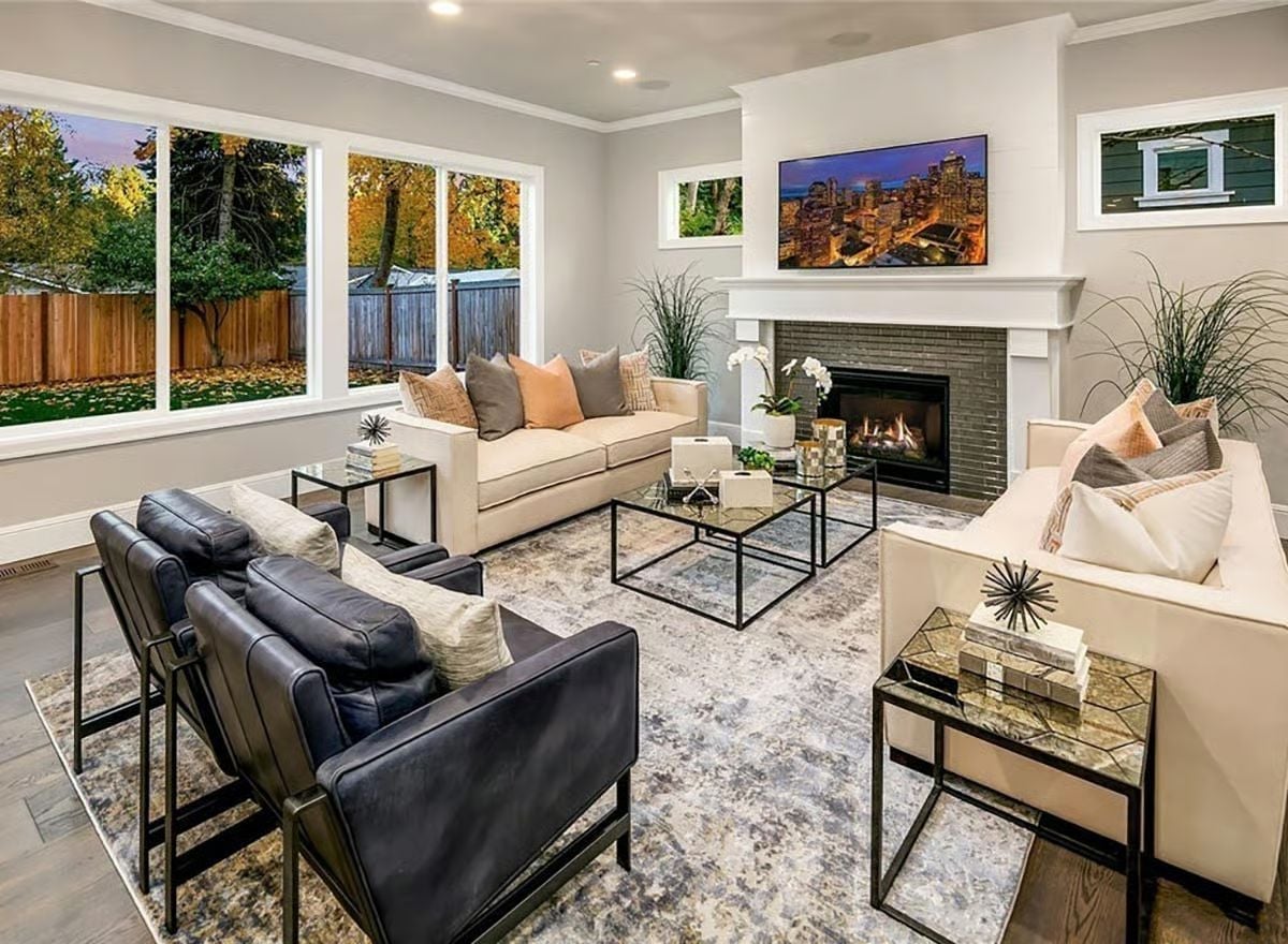Leather Chairs and a Live Fireplace Pull the Whole Room Together