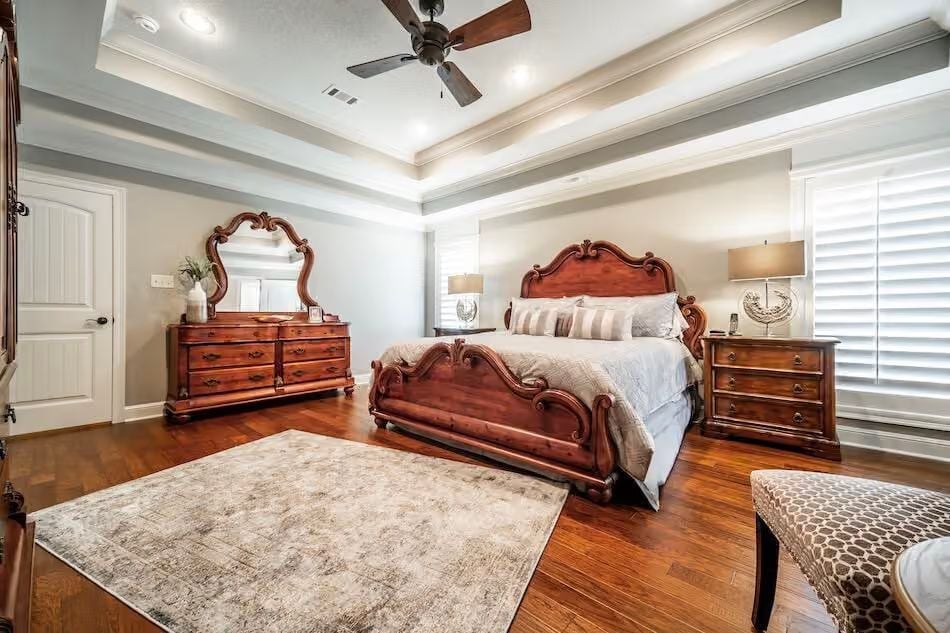 Carved Walnut Headboard and Footboard That Justify the Square Footage