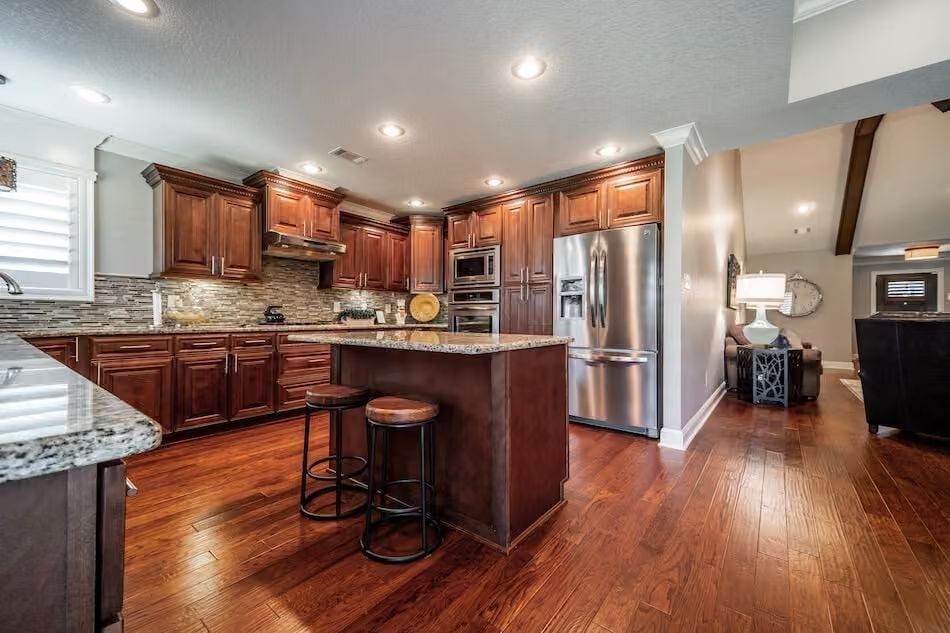 Cherry Cabinets and Granite Counters That Mean Business in the Kitchen