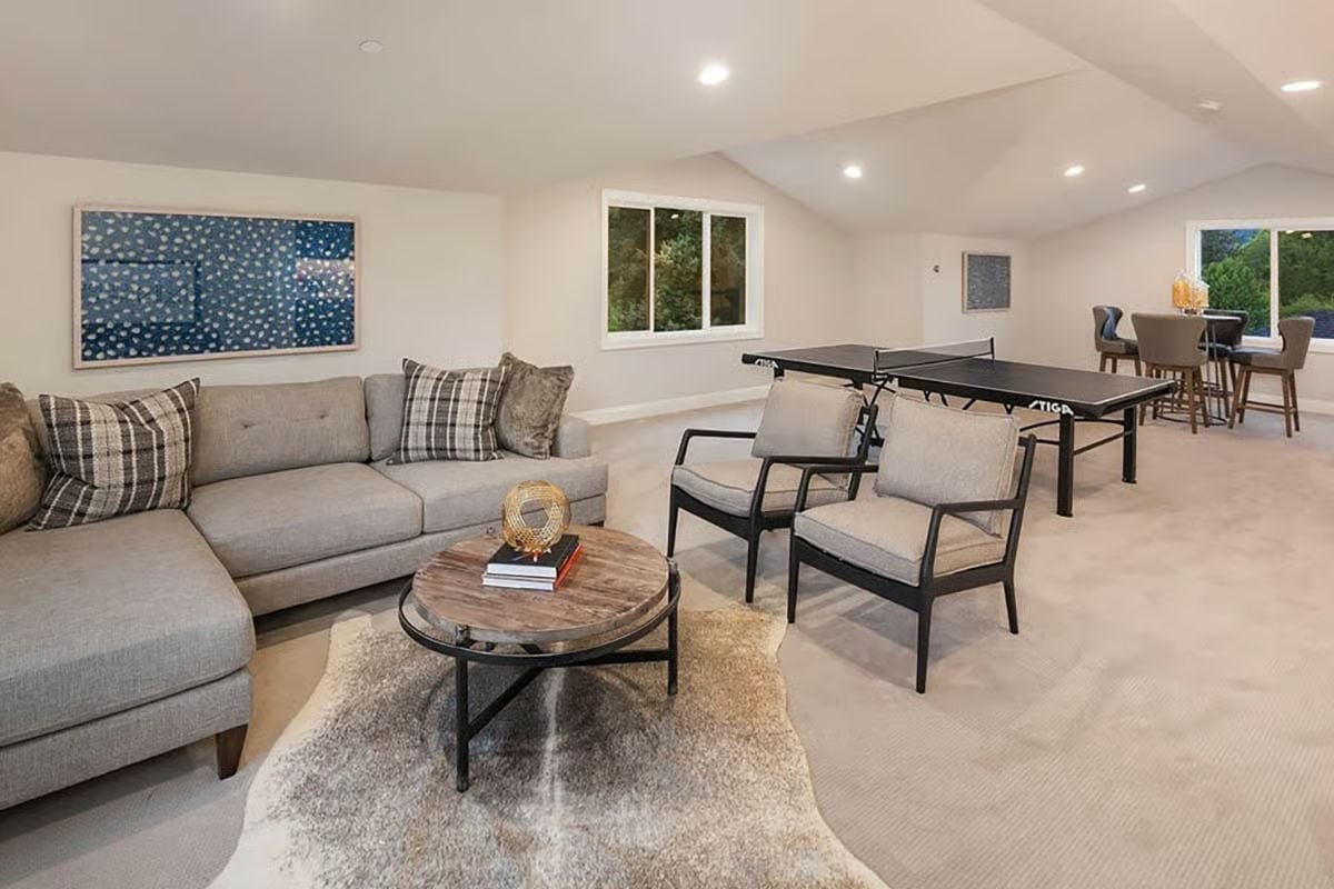 Ping-Pong Table at One End, Sectional at the Other — Game Room Done Right