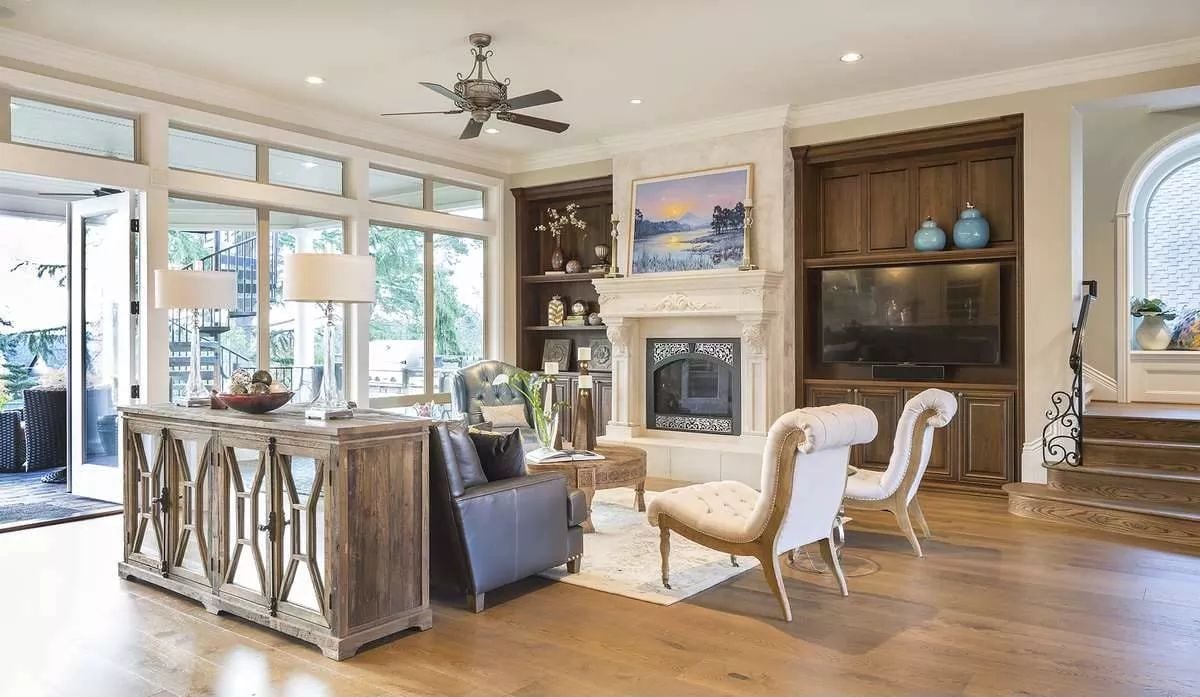 Carved Fireplace Surround Anchors a Room Built Around Real Comfort