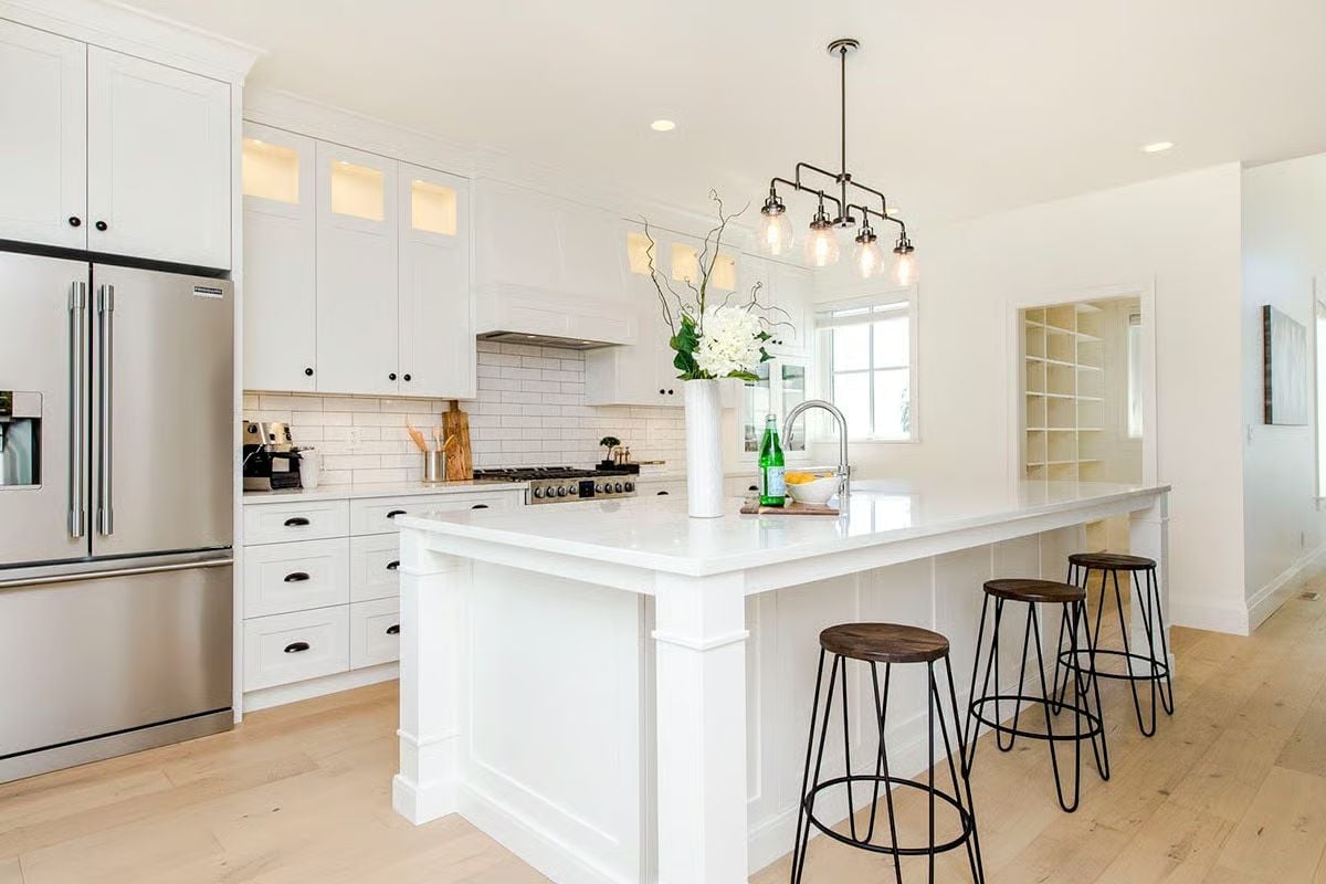 Hairpin Stools and a Sink-in-the-Island Setup Built for Actual Cooking