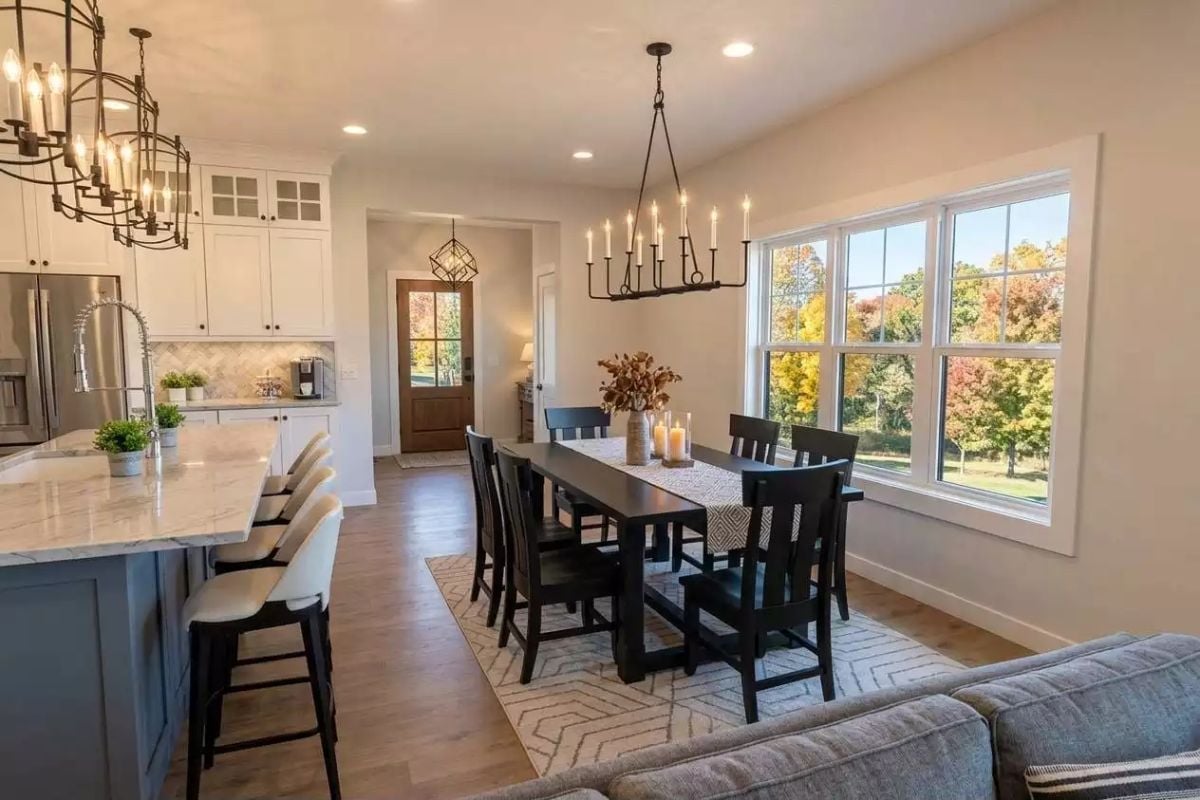 Candle-Style Chandeliers and a Dark Dining Table That Means Business