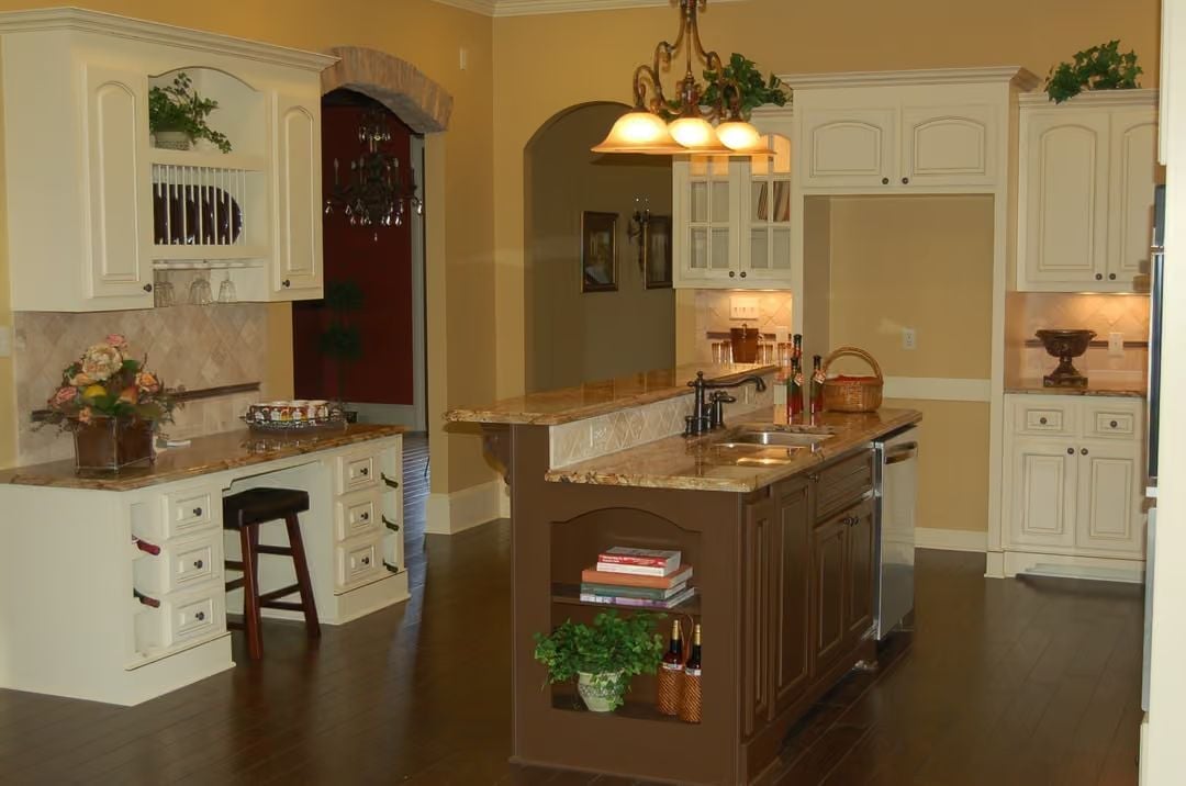 Cream Cabinetry and a Two-Tone Island Make the Kitchen Do Double Duty