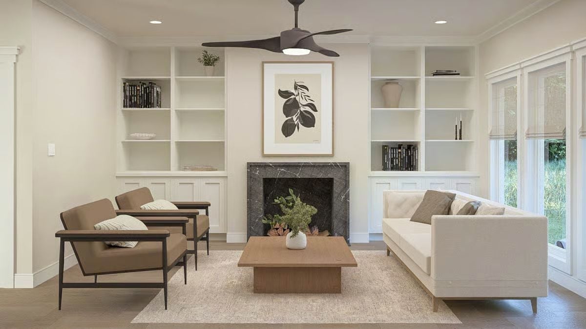 Built-In Shelving That Earns Its Place Around a Marble Fireplace