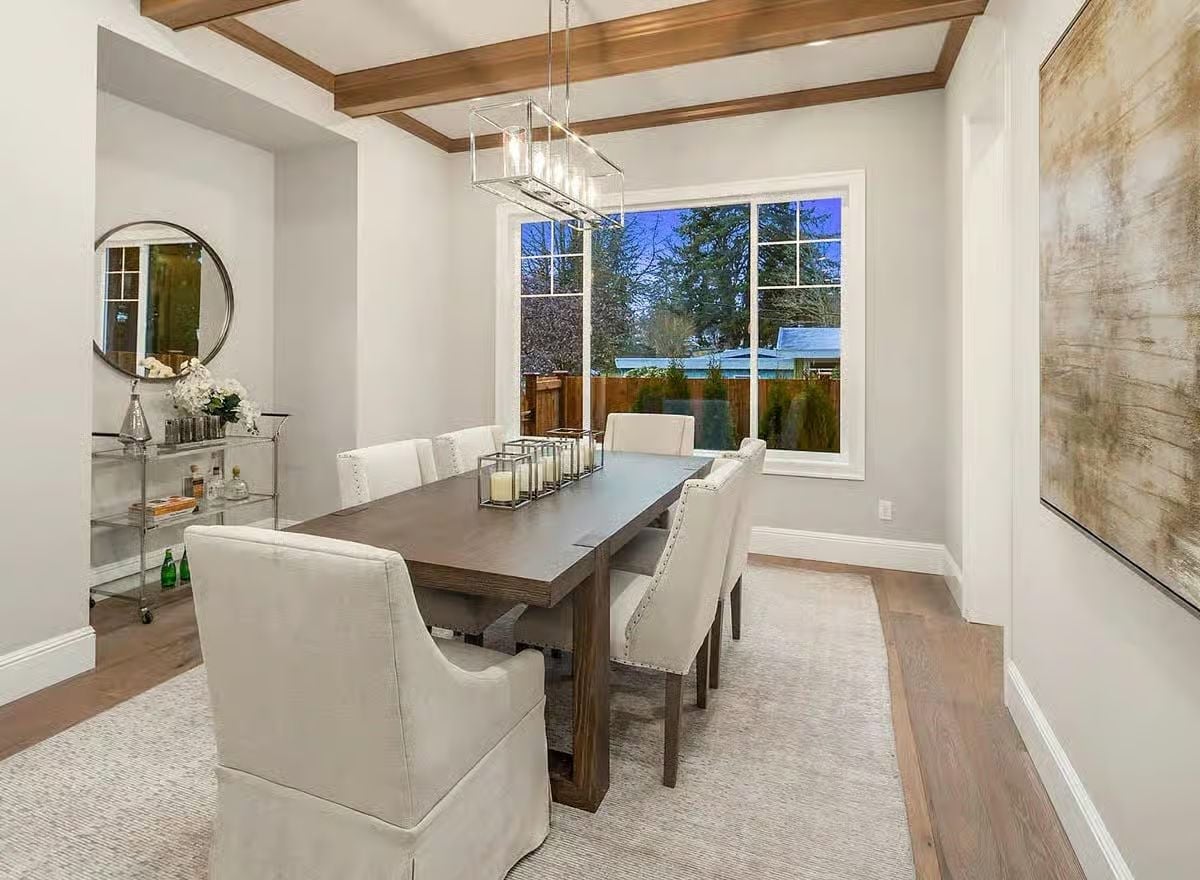 Coffered Ceiling, Candlelight, and White Linen Chairs That Pull It All Together