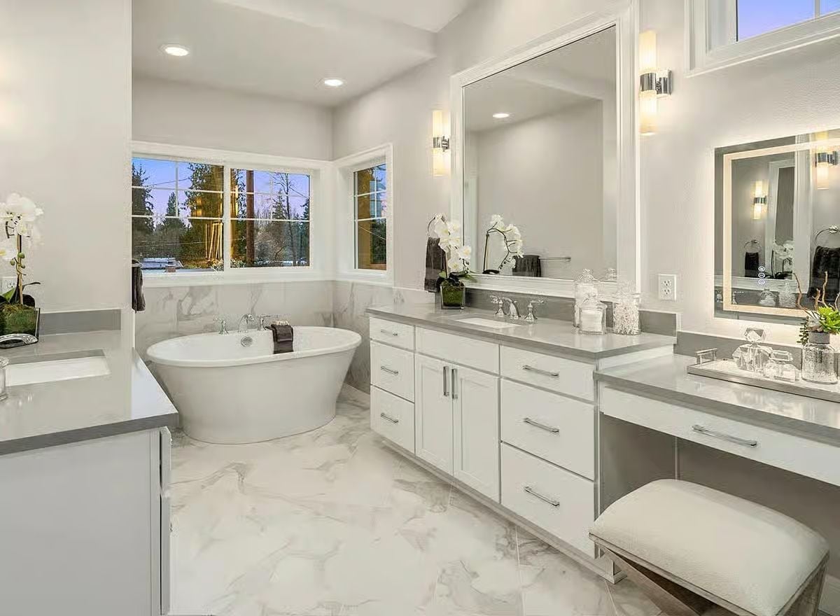 Freestanding Soaker, Marble Floors, and a Vanity Built for Two