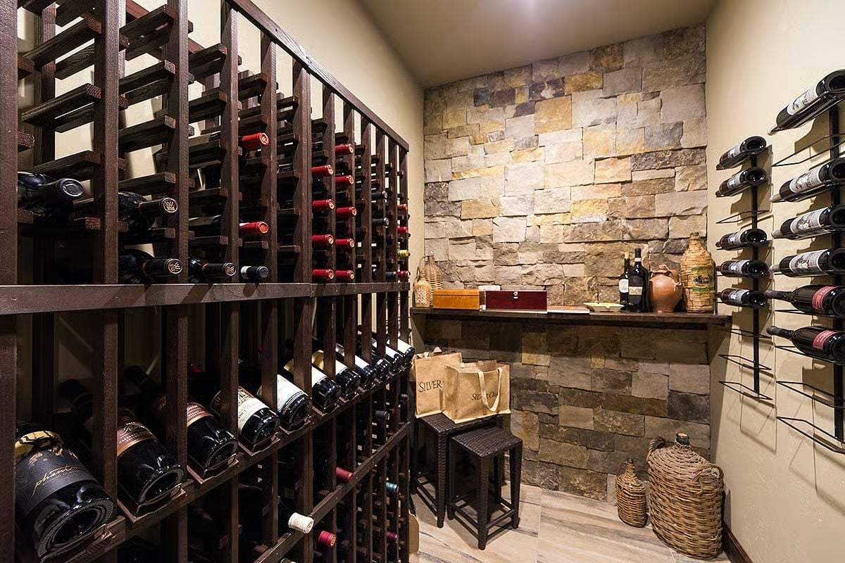 Hundreds of Bottles, One Stone Wall, and a Room That Means Business