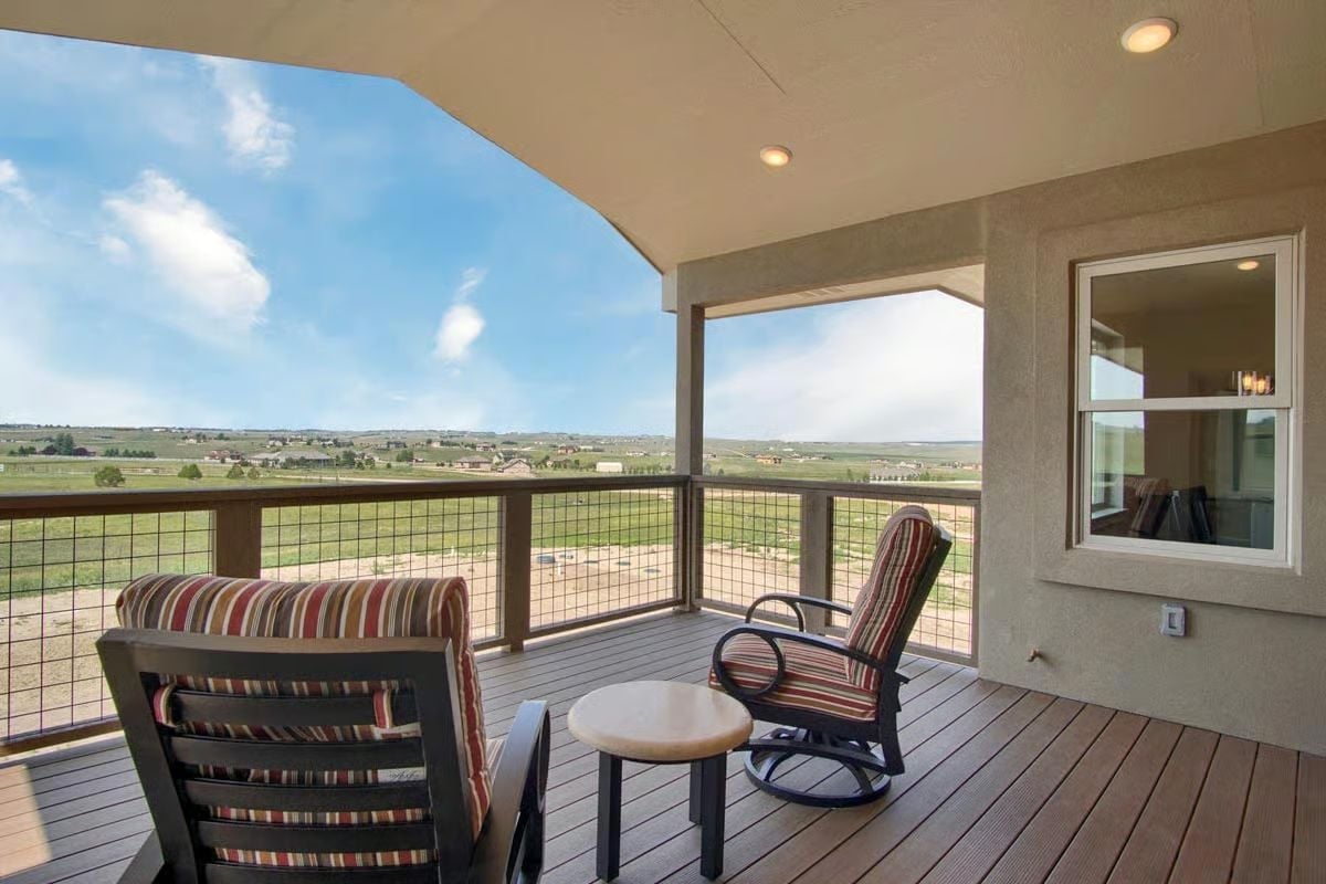 Covered Deck, Wire Rail, and a View That's Not Pretending to Be Modest