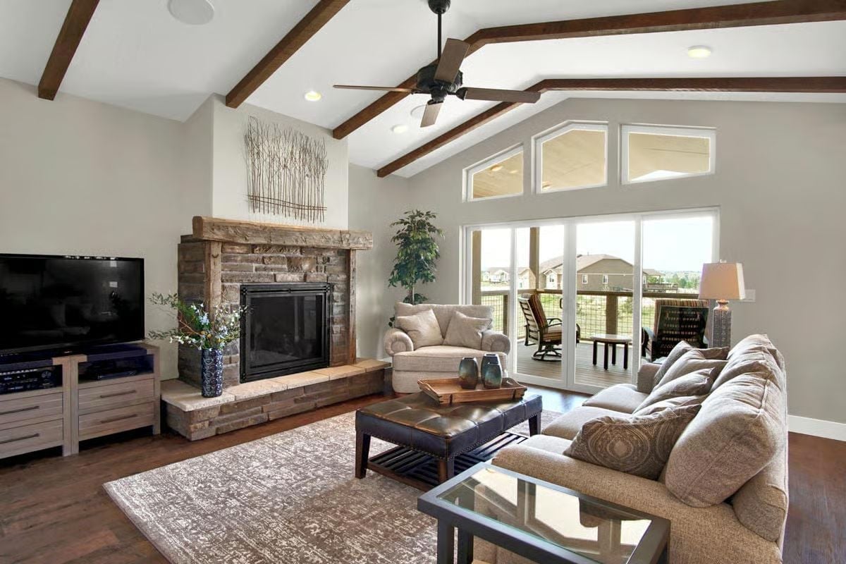 Exposed Beams and a Stone Fireplace That Actually Earns the Square Footage