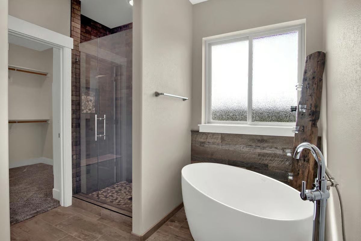 Freestanding Tub Next to Reclaimed Wood That Isn't Trying Too Hard