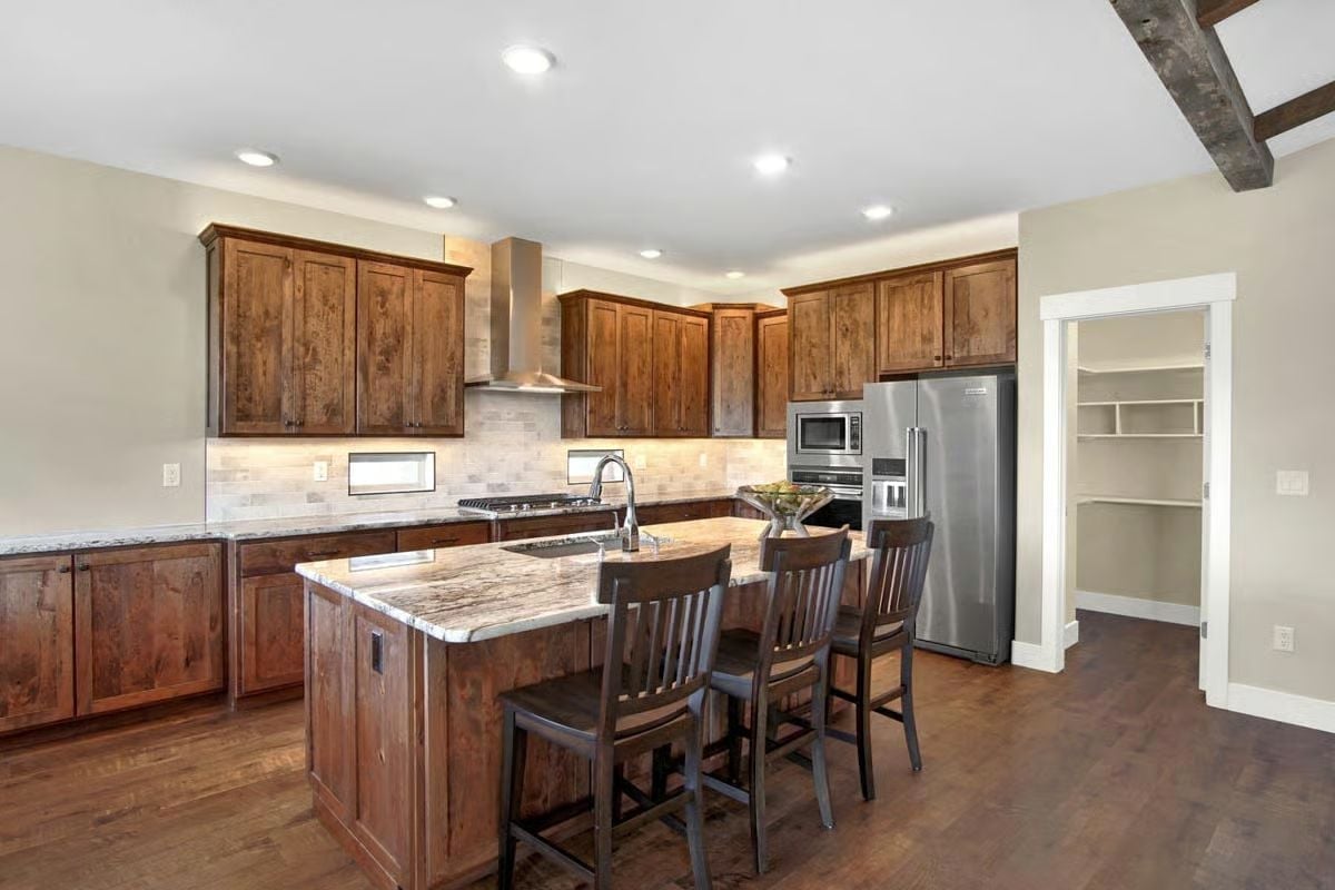 Knotty Alder Cabinets and a Sink Faucet That's Nowhere Near Center