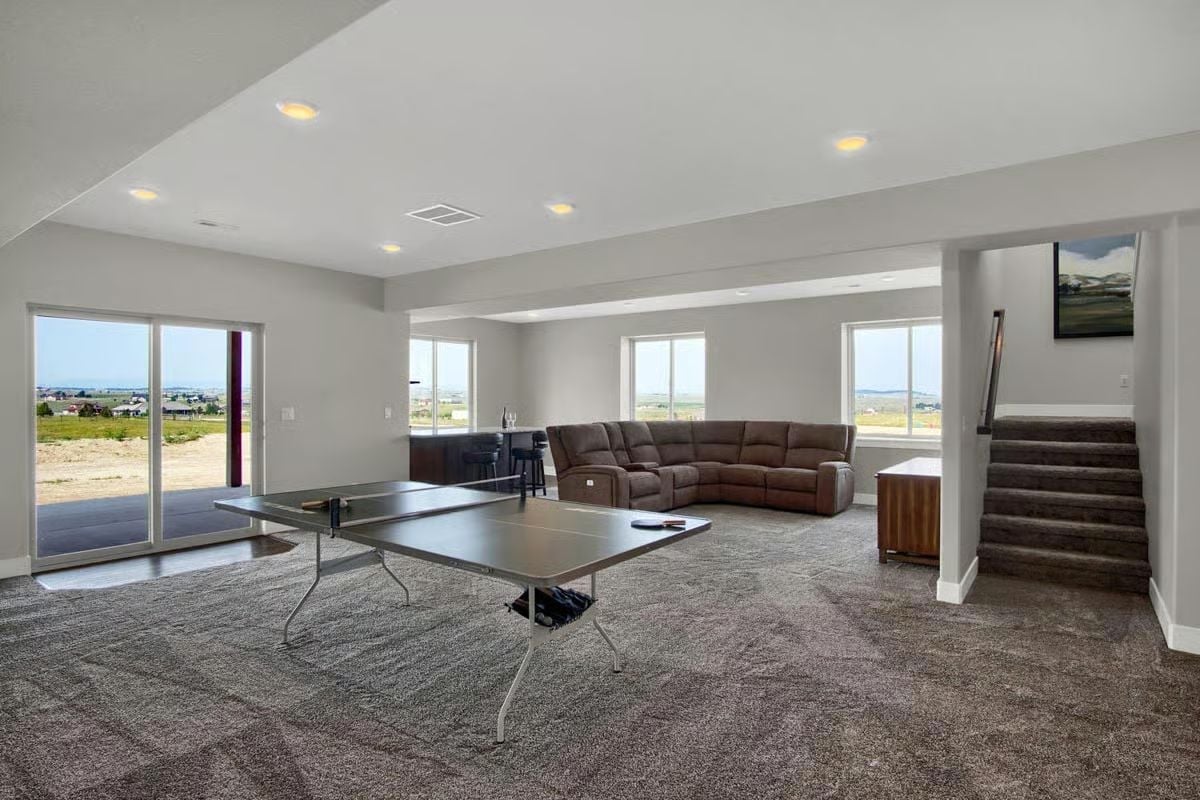 Ping-Pong Table, Sectional, and a View That's Doing Serious Work