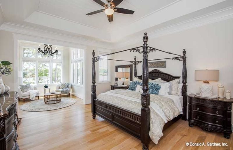 Dark Mahogany Posts, Canopy Hardware, and a Bedroom That Means Business