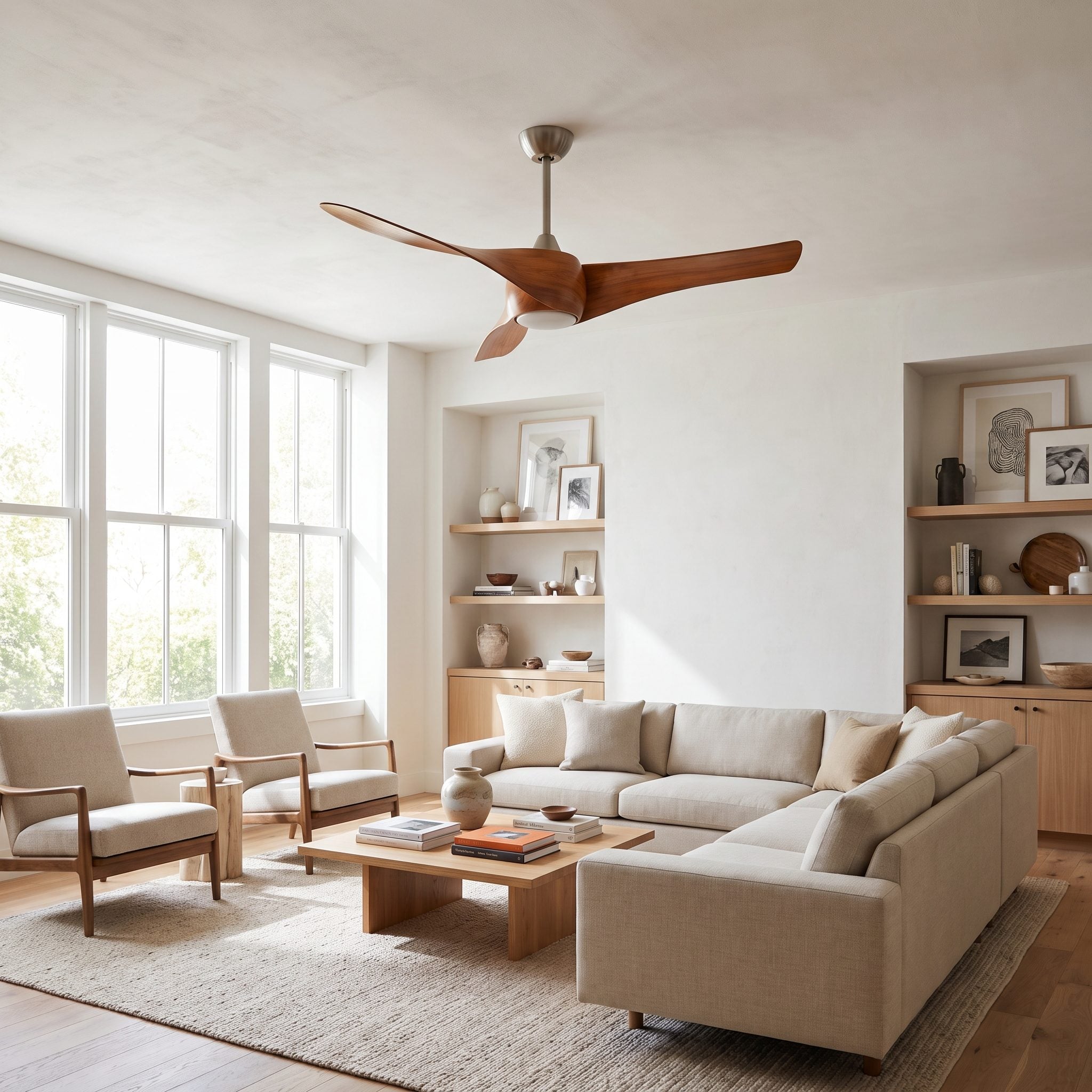 Living room with a three-blade brass Minka-Aire Artemis ceiling fan spanning about 58 inches above an 84-inch sofa.