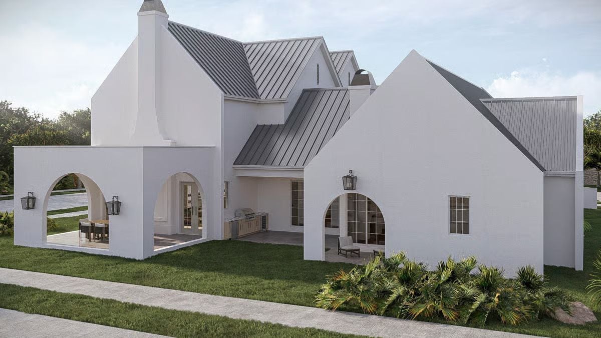 Arched Openings and White Stucco Make This Backyard Hard to Walk Past