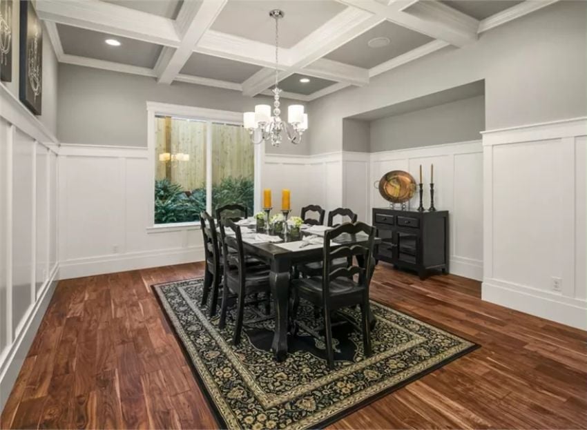 Coffered Ceiling and Candlelight: Where Black Lacquer Pulls the Room Together