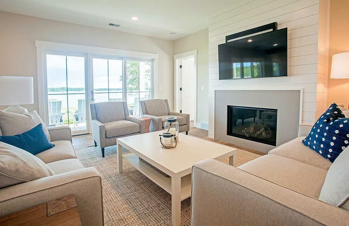 Shiplap Fireplace Wall, Lake Views, and Sofas You Won't Want to Leave