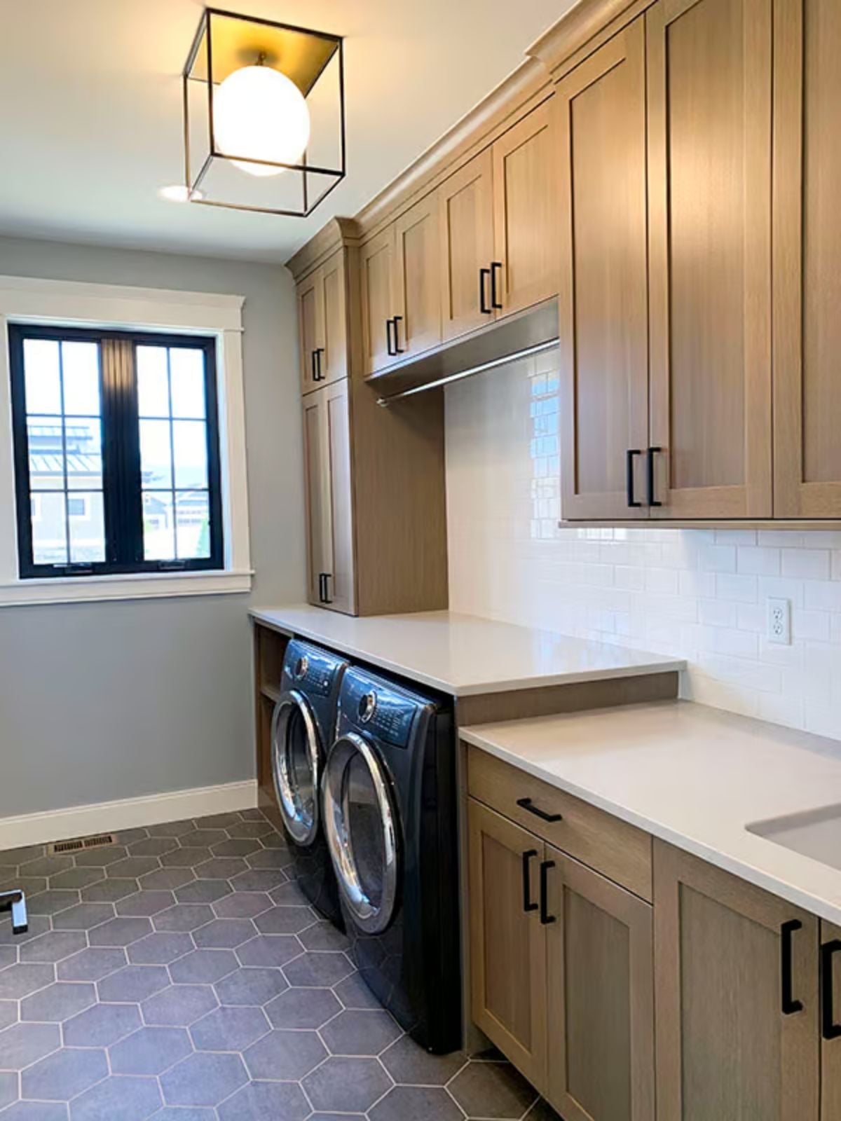 Hex Tile, a Hanging Rod, and a Laundry Room That Actually Works