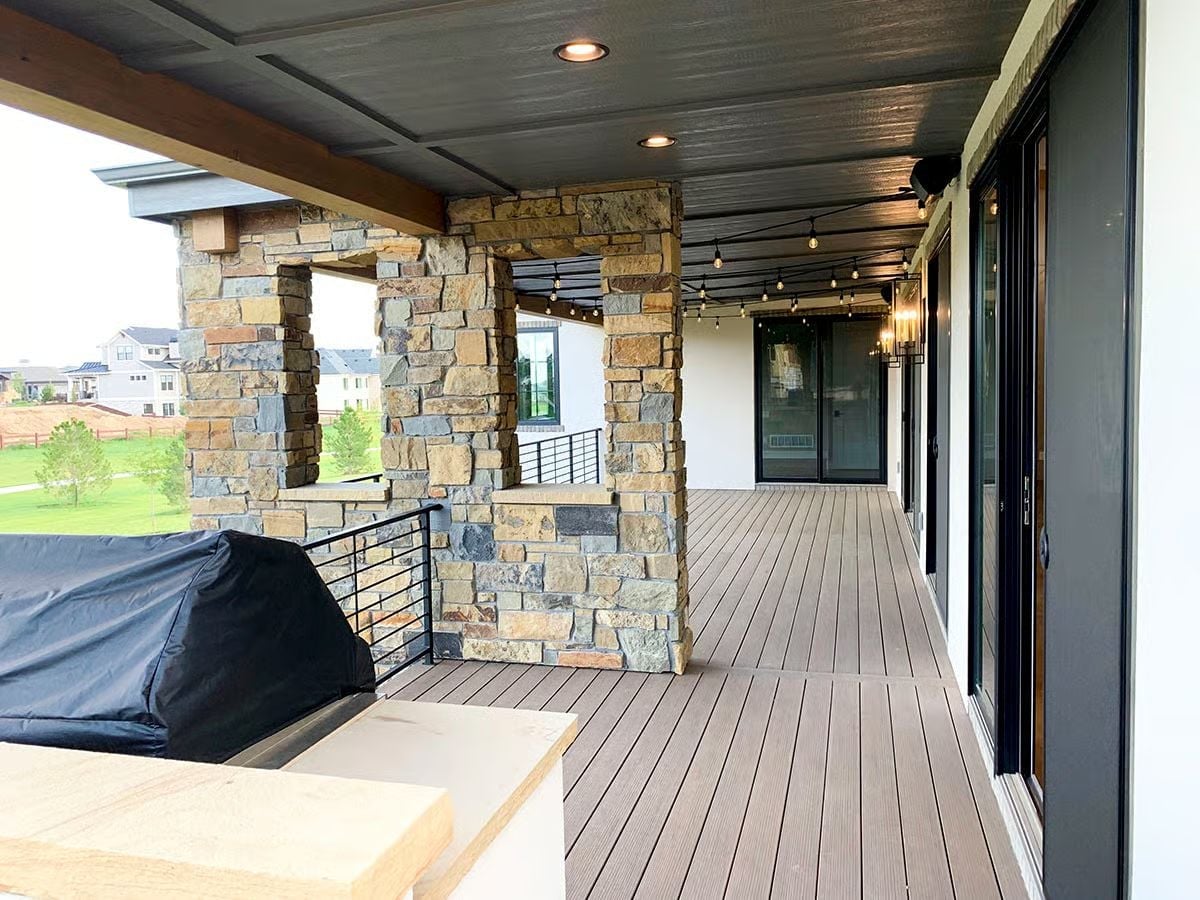 Stone Columns, String Lights, and a Covered Deck Built for Real Use